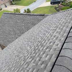 two sections of roof with gray shingles