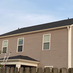 two sections of roof with gray shingles