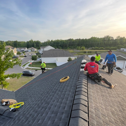 two men working on a roof